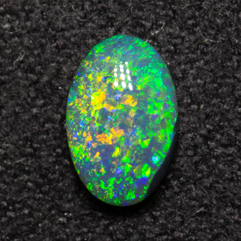 0.56 ct double-sided black opal 6.9x4.5x2.8mm - Image 4