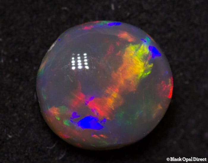 0.56 ct semi black opal 5.5x5x3mm - Image 2
