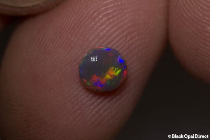 0.56 ct semi black opal 5.5x5x3mm - Image 3