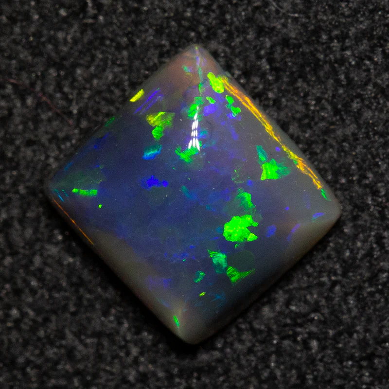 0.57 ct black opal 5.7x5.4x2.6mm - Image 2