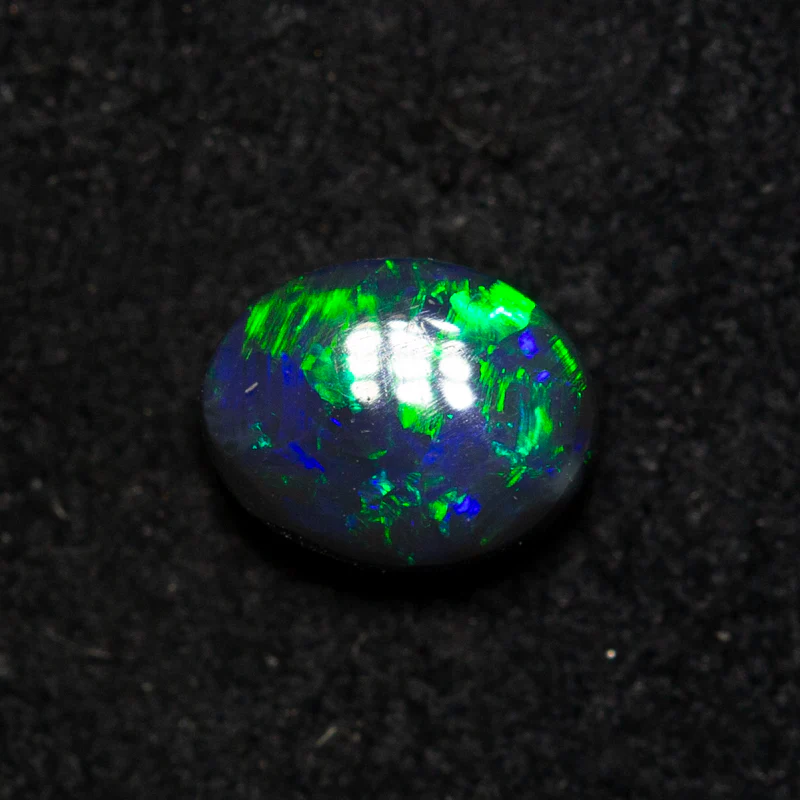 0.57 ct black opal 5.9x4.6x3mm - Image 3