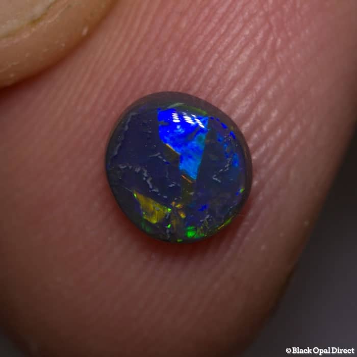 0.57 ct black opal 6.5x6x2mm - Image 3