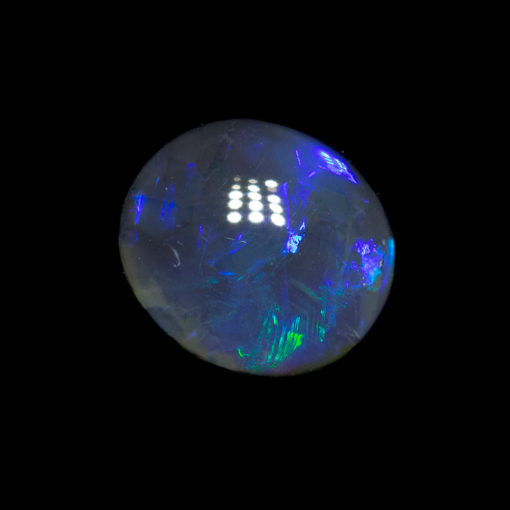 0.57 ct black opal 6x5.3x2.8mm - Image 2