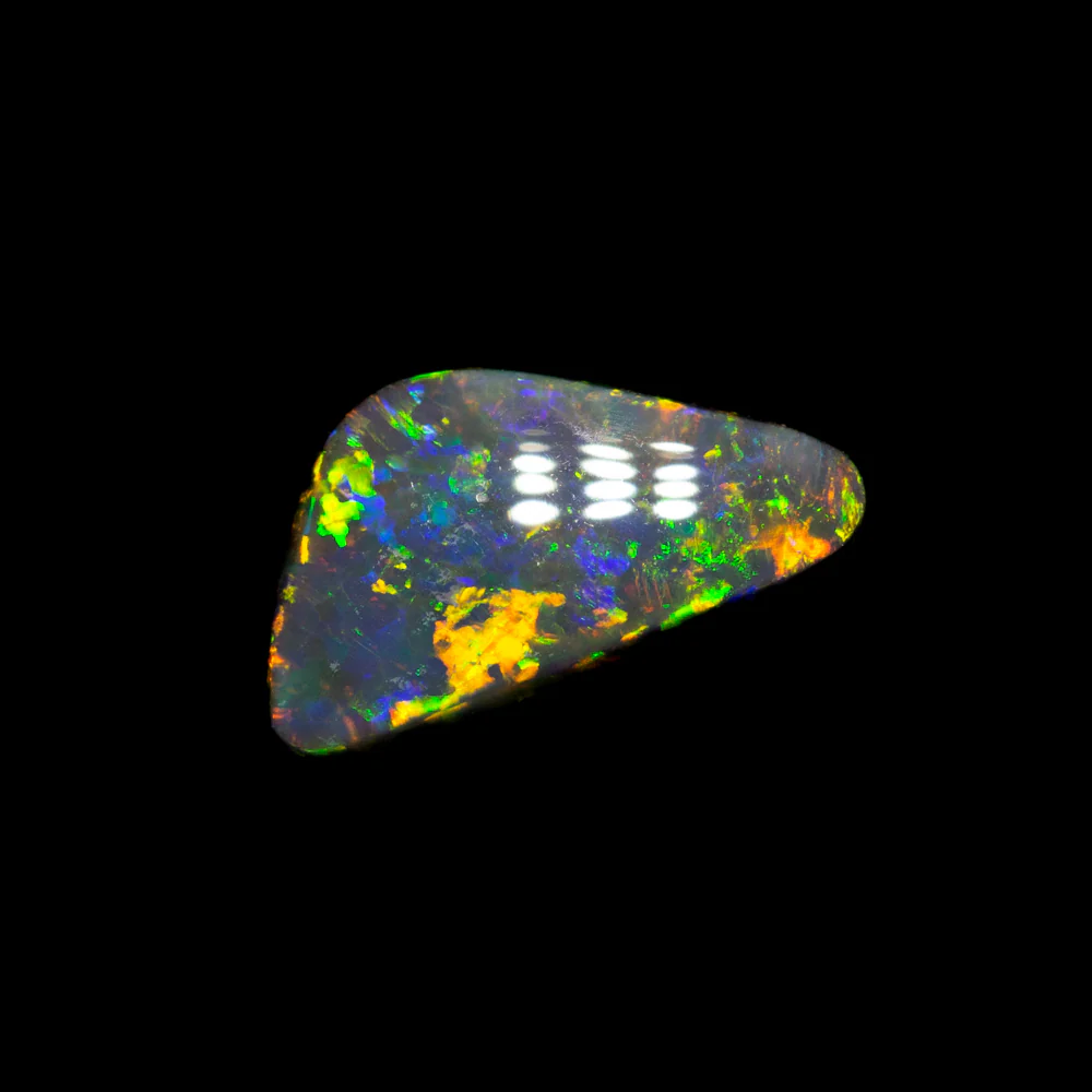 0.57 ct black opal 8.3x4.5x2.6mm - Image 2