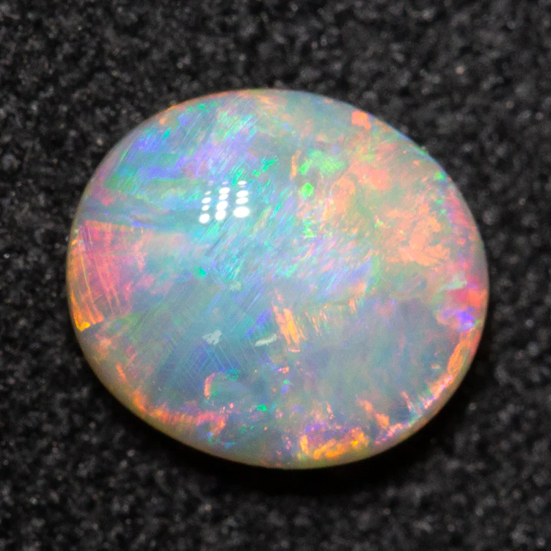 0.57 ct crystal opal 6.1x5.4x2.7mm - Image 3