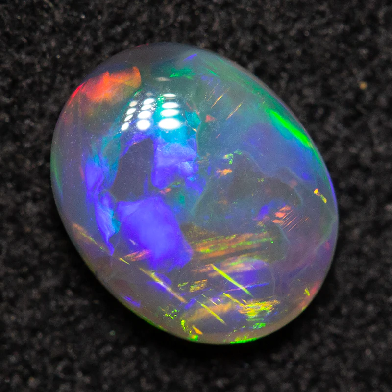 0.57 ct dark crystal opal 6.6x5.3x2.5mm - Image 2