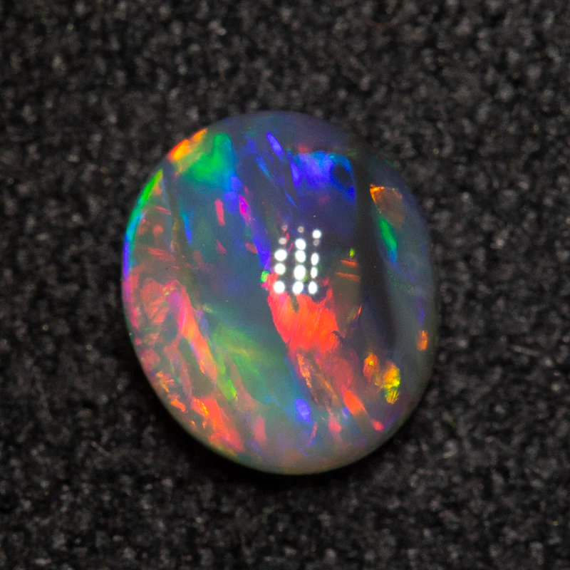 0.57 ct dark opal 6.1x5.3x2.8mm - Image 2