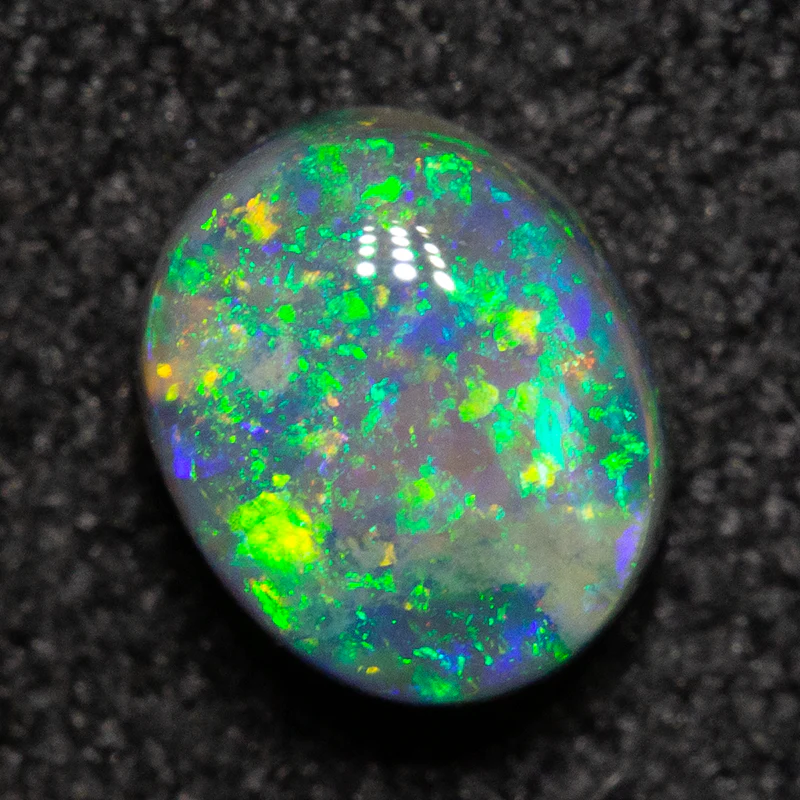 0.58 ct black opal 5.6x4.6x3.2mm - Image 2