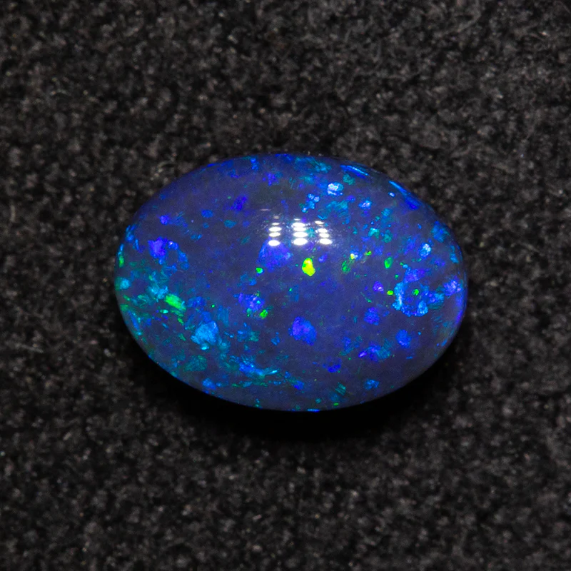 0.58 ct black opal 6.2x4.5x3.2mm - Image 2