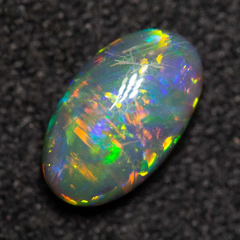 0.58 ct black opal 7.3x4.4x2.8mm - Image 4
