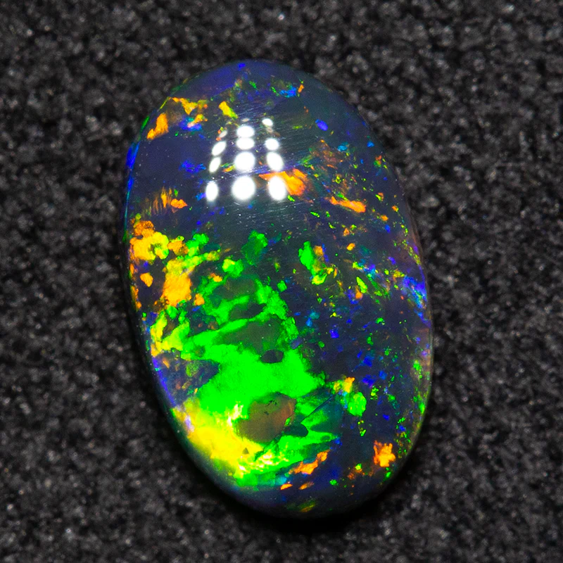 0.58 ct black opal 7.5x5.8x2.4mm - Image 2