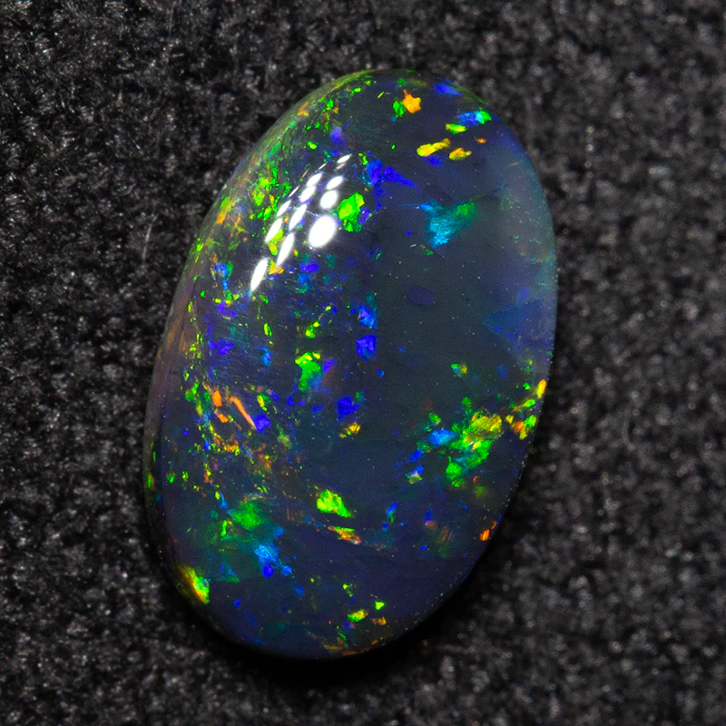 0.58 ct black opal 7.5x5.8x2.4mm - Image 3