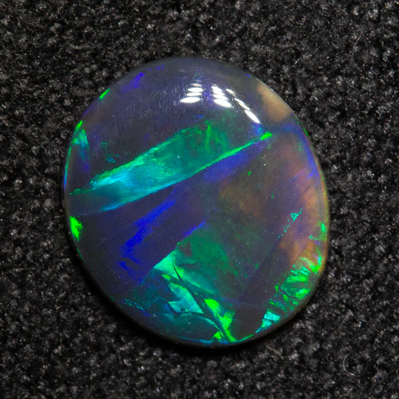 0.58 ct black opal 7.8x6.8x1.5mm - Image 2
