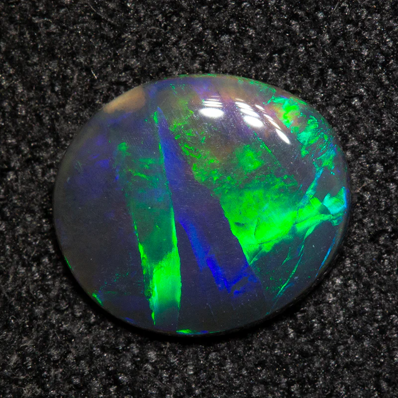0.58 ct black opal 7.8x6.8x1.5mm - Image 3