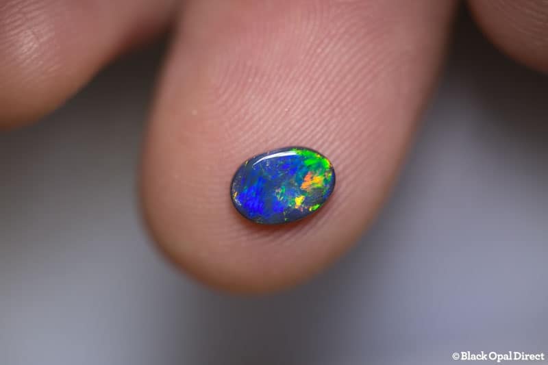 0.58 ct black opal 7x5x2mm - Image 2