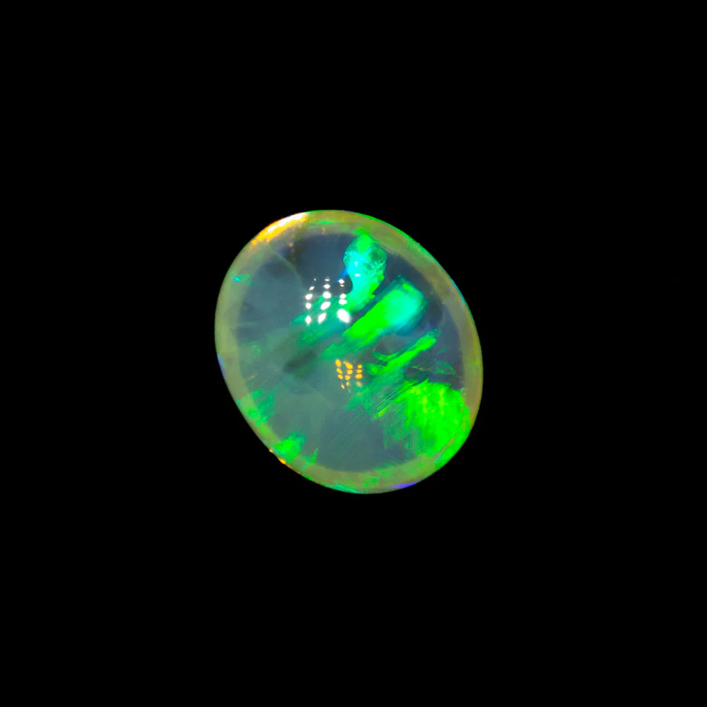 0.58 ct crystal opal 5.8x4.8x3.5mm - Image 2