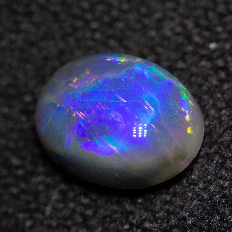 0.58 ct dark opal 6.3x4.7x3.3mm - Image 2