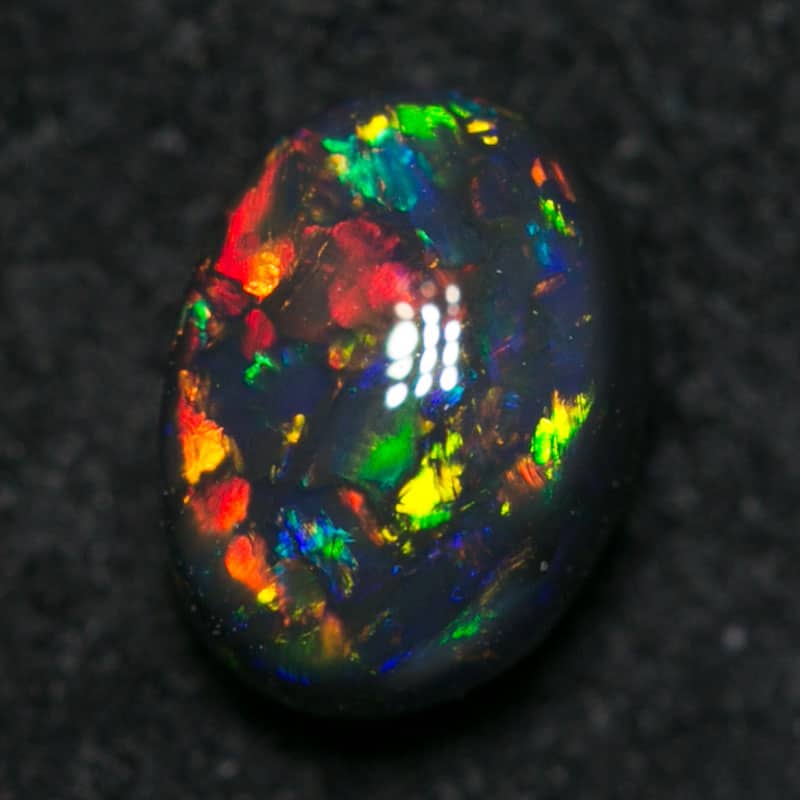 0.58 ct gem black opal 6x5x3 - Image 2