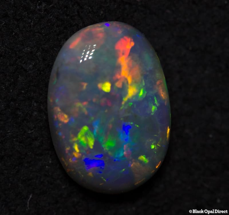 0.58 ct semi black opal 7x5x2mm - Image 2