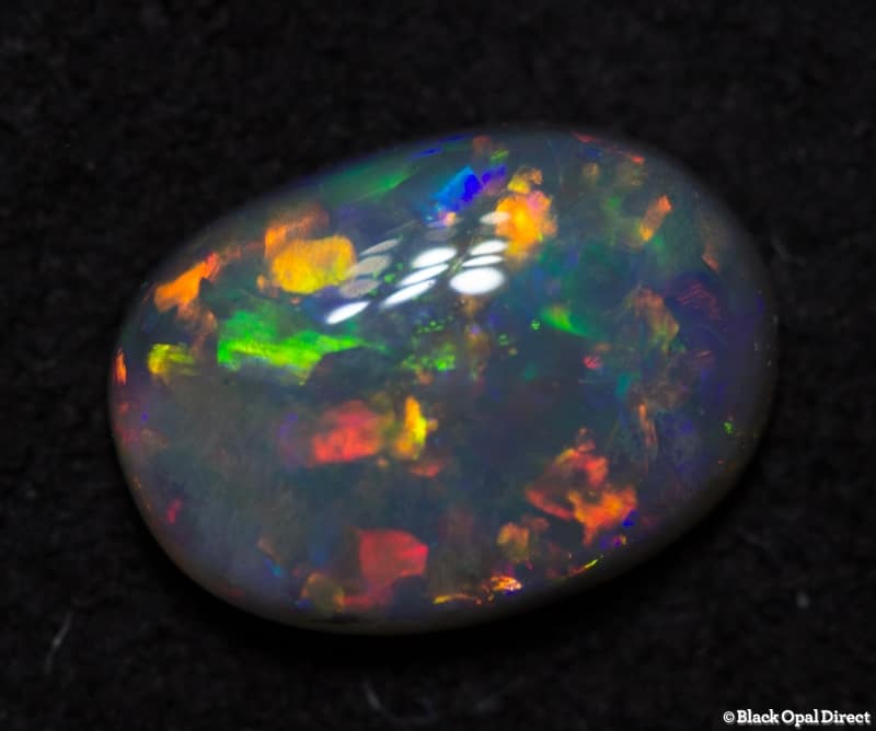 0.58 ct semi black opal 7x5x2mm - Image 3
