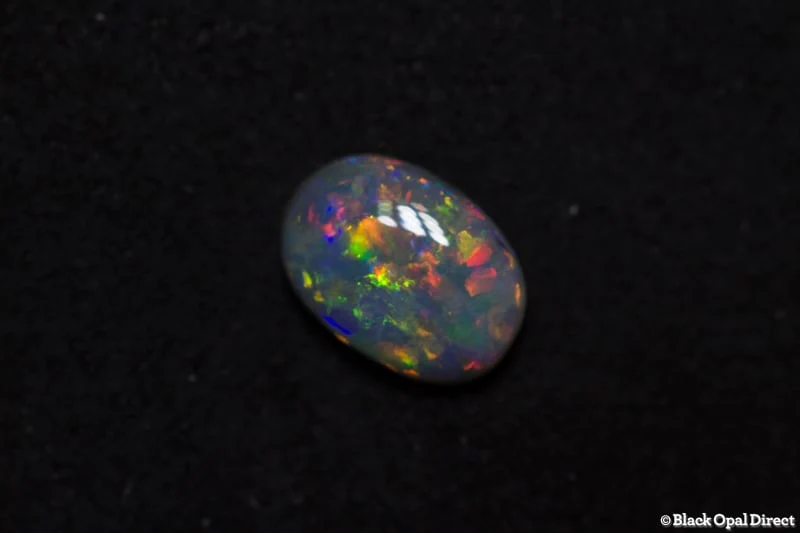 0.58 ct semi black opal 7x5x2mm - Image 4