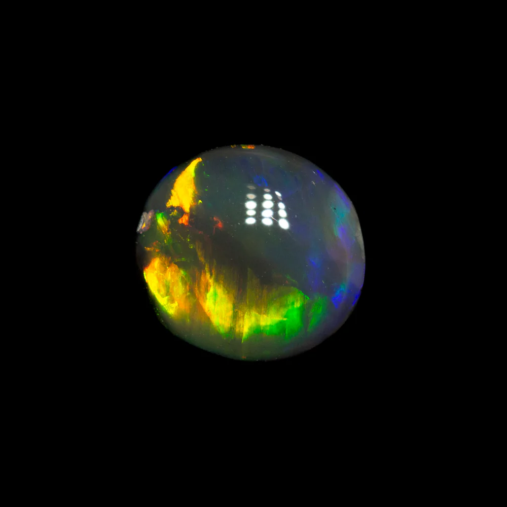 0.59 ct black opal 6.3x5.8x2.3mm - Image 2