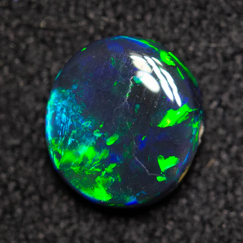 0.59 ct black opal 6.4x5.8x2.2mm - Image 4