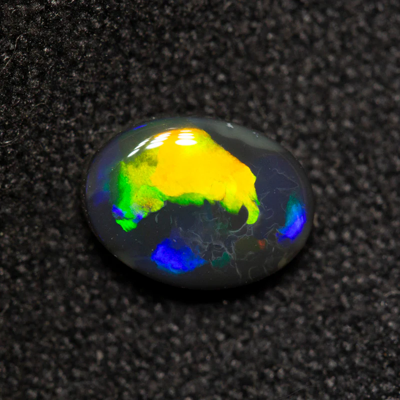 0.59 ct black opal 6.6x4.9x2.6mm - Image 2