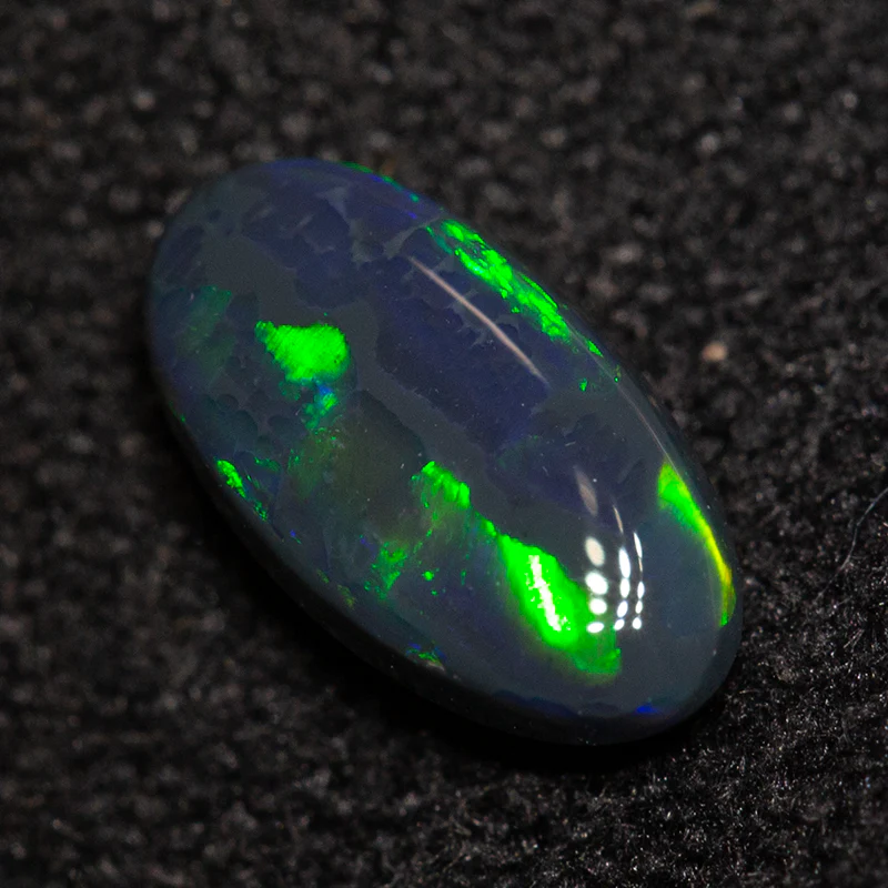 0.59 ct black opal 7.8x4.2x2.7mm - Image 2
