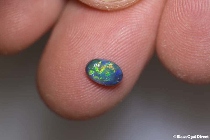 0.59 ct black opal 7x4.5x2mm - Image 3