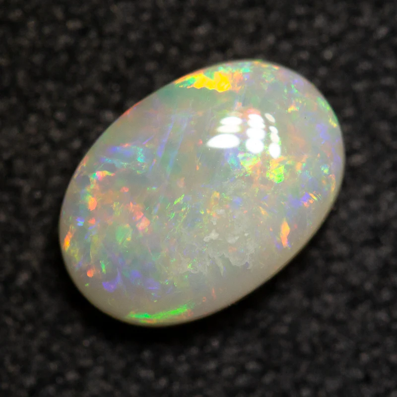 0.59 ct white opal 6.8x4.8x2.5mm - Image 2