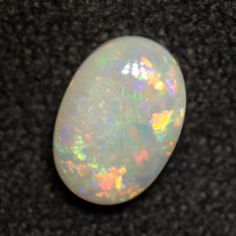 0.59 ct white opal 6.8x4.8x2.5mm - Image 3