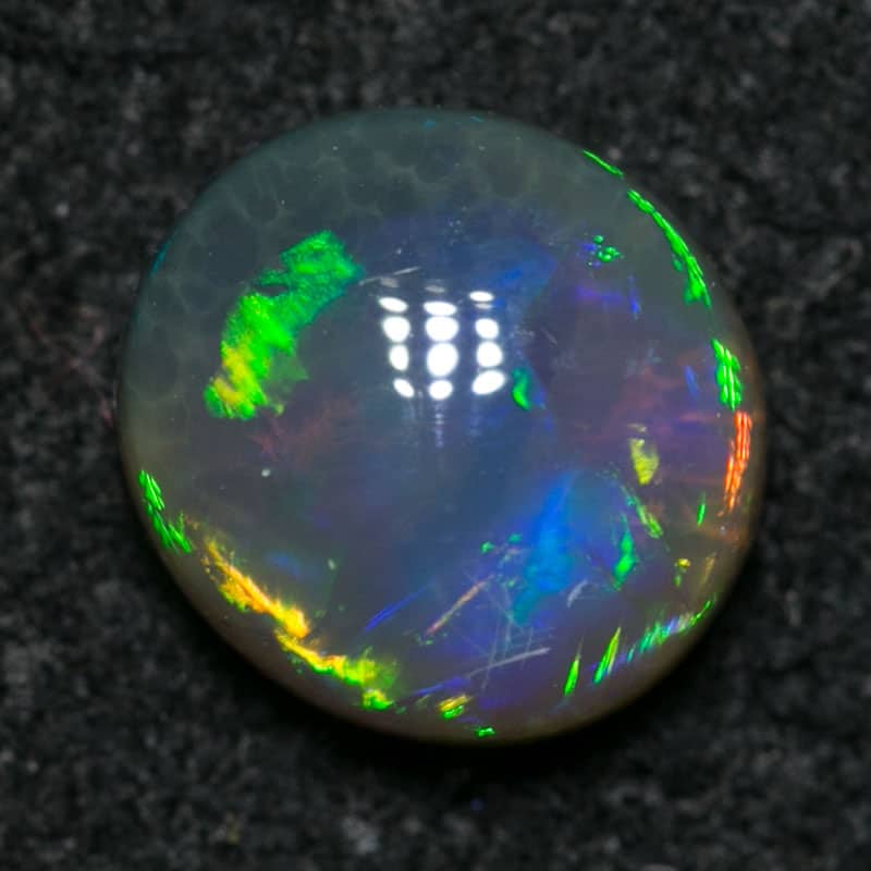 0.60 ct black opal 5.5x5x3mm - Image 2