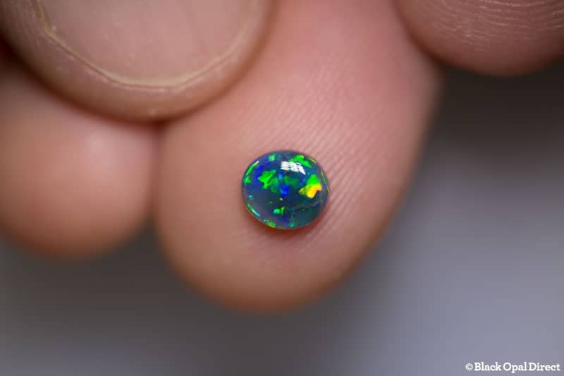 0.60 ct black opal 6x5x2mm - Image 3