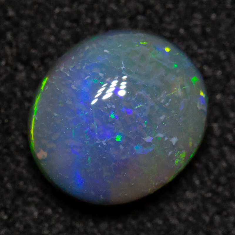0.60 ct dark opal 6.1x5.4x3mm - Image 3