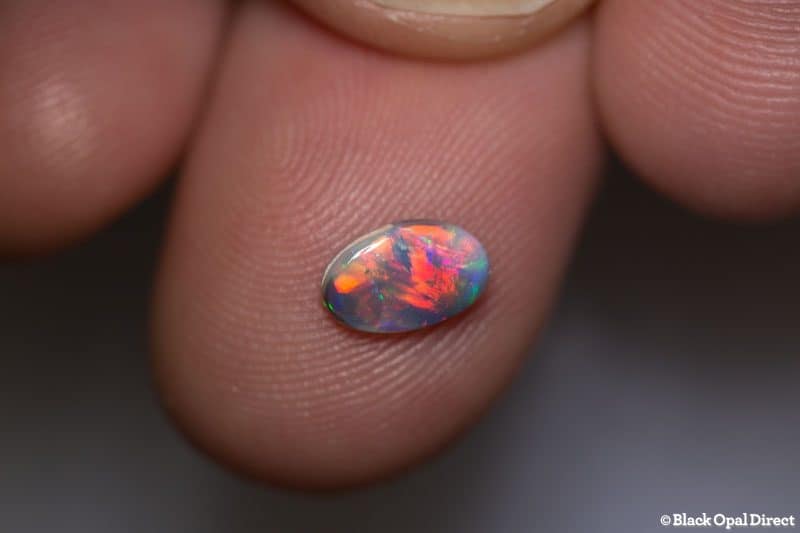 0.60 ct dark opal 8x5x2mm - Image 2