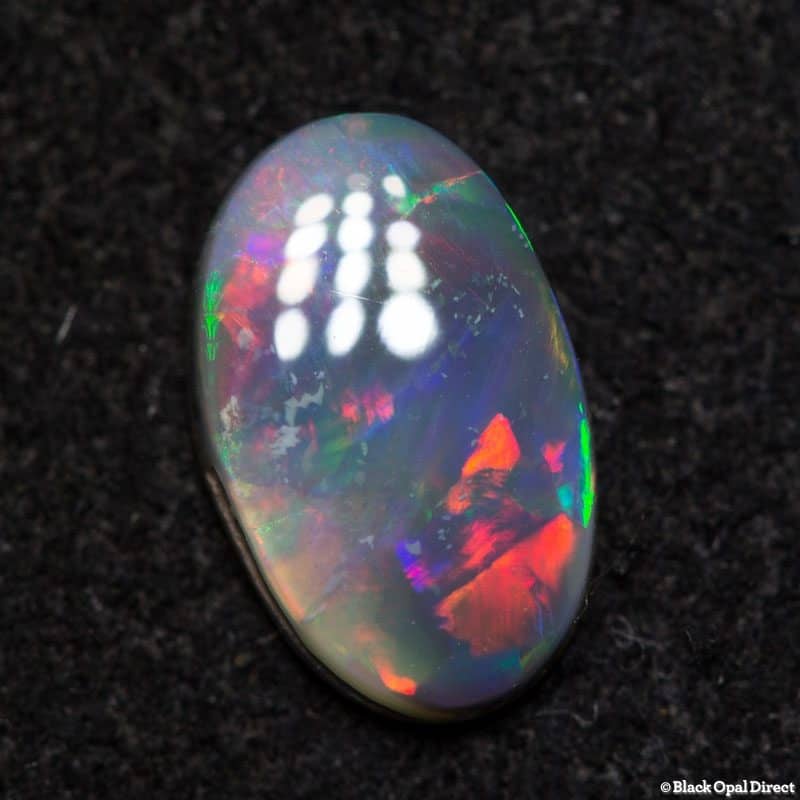 0.60 ct dark opal 8x5x2mm - Image 3
