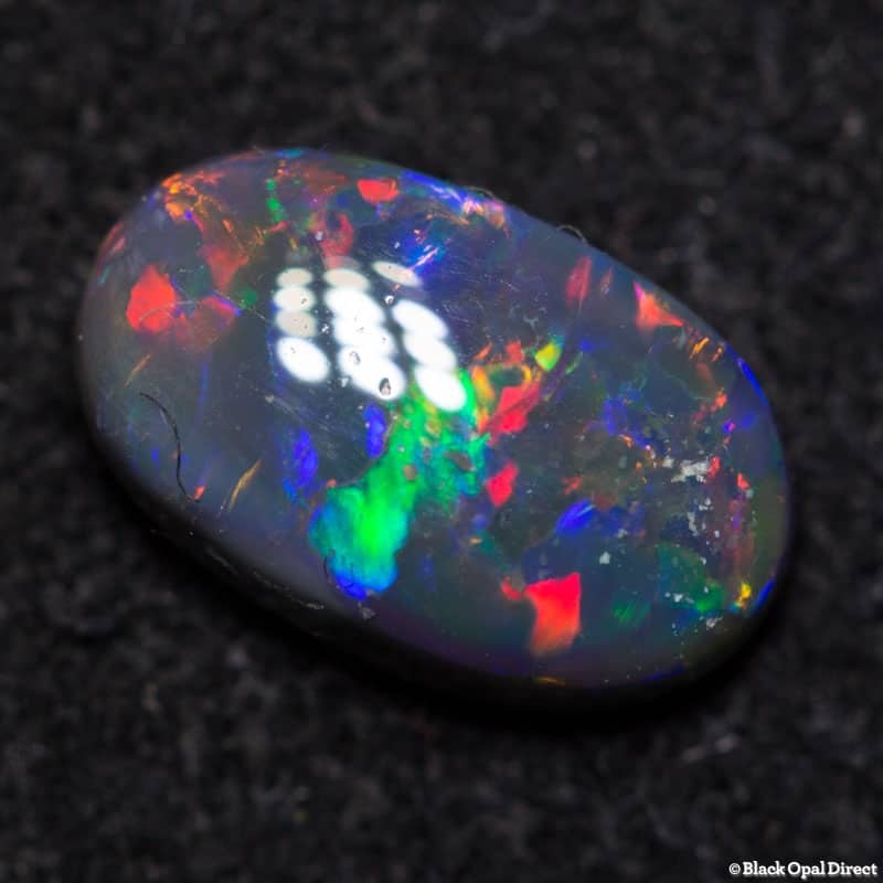 0.61 ct black opal 7.5x4.5x2mm - Image 2