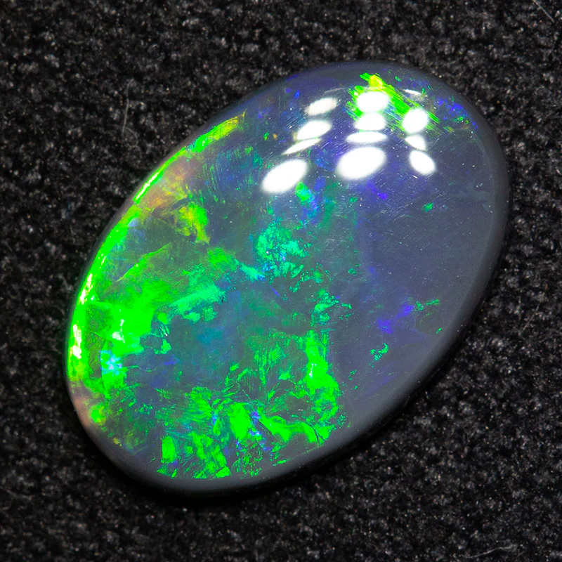 0.61 ct black opal 9.6x6.5x1.5mm - Image 2