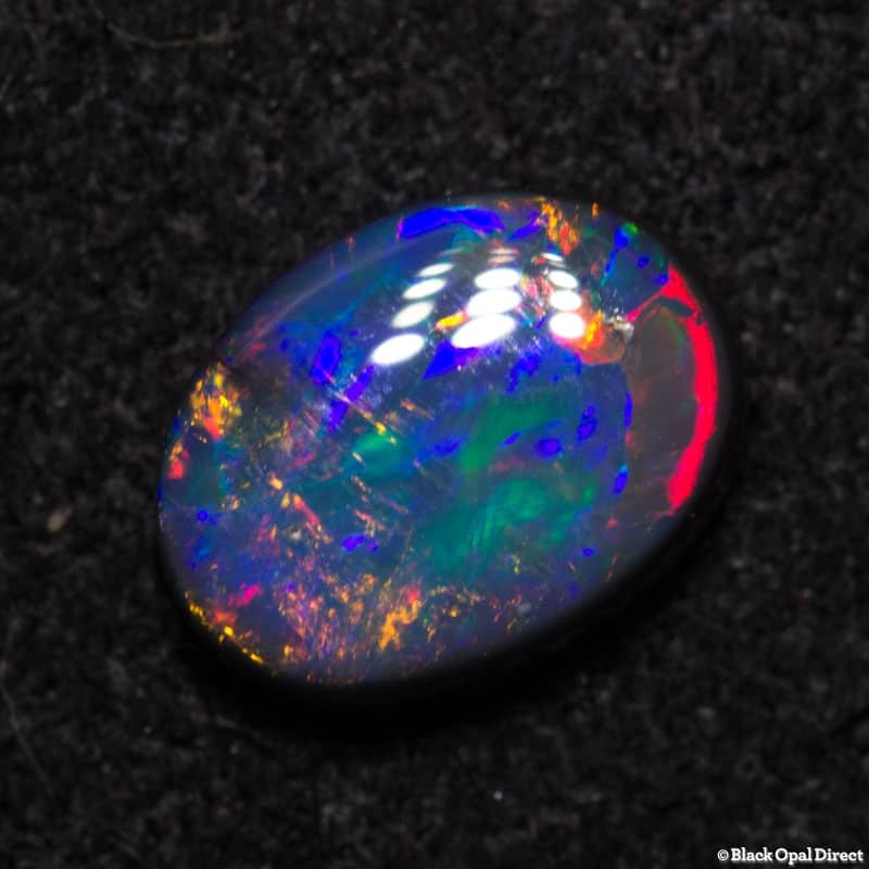0.61 ct black opal gem 7x5x2.2mm - Image 3