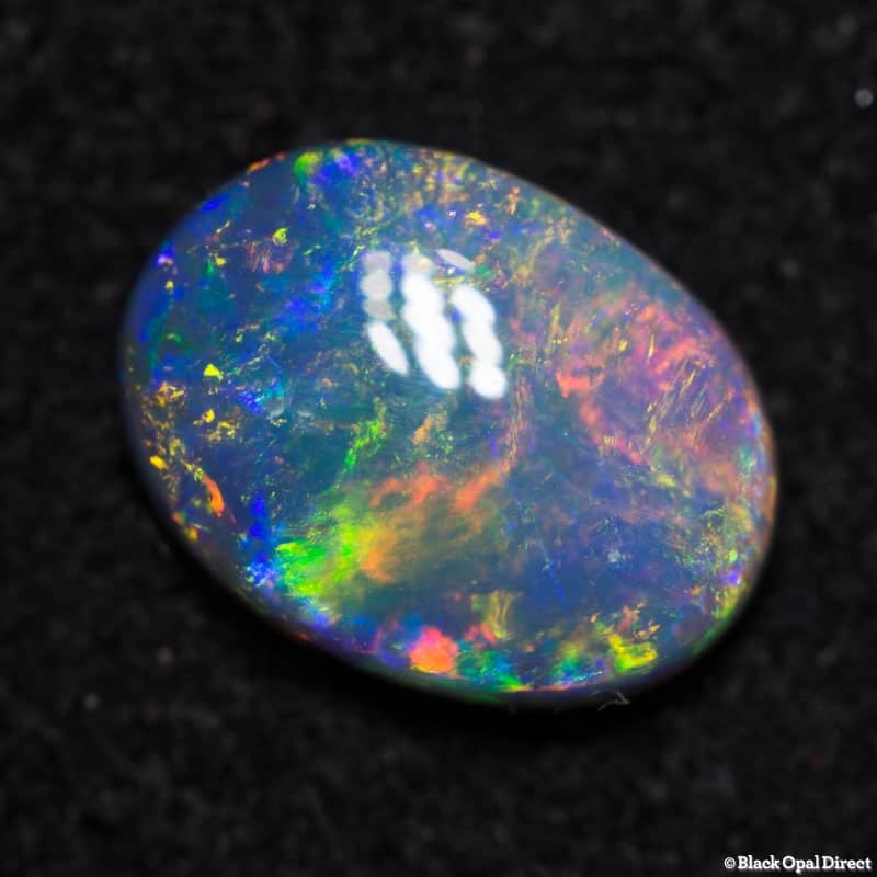 0.61 ct dark opal 7x5x2mm - Image 2