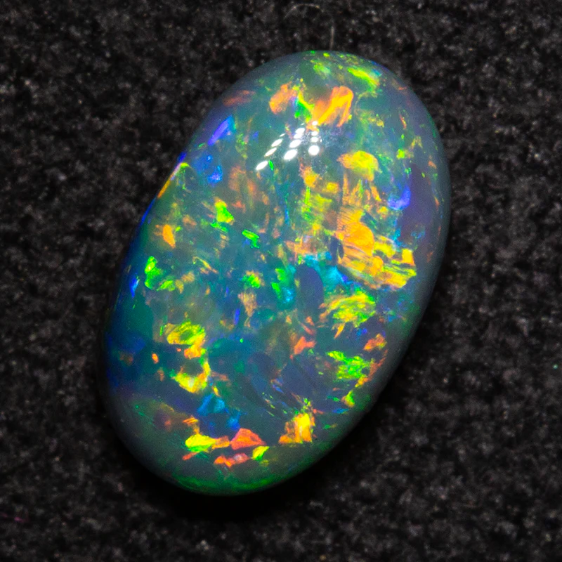 0.61 ct double-sided black opal 6.9x4.4x2.9mm - Image 2