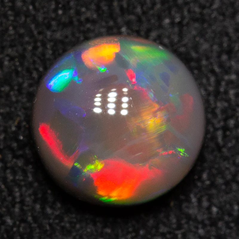 0.62 ct black opal 5.6x5.6x5.2mm - Image 2