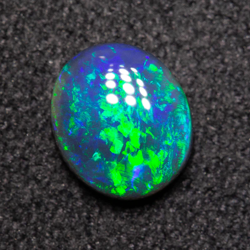 0.62 ct black opal 6.4x5.5x2.7mm - Image 2