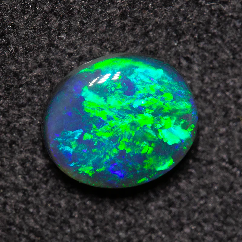 0.62 ct black opal 6.4x5.5x2.7mm - Image 3