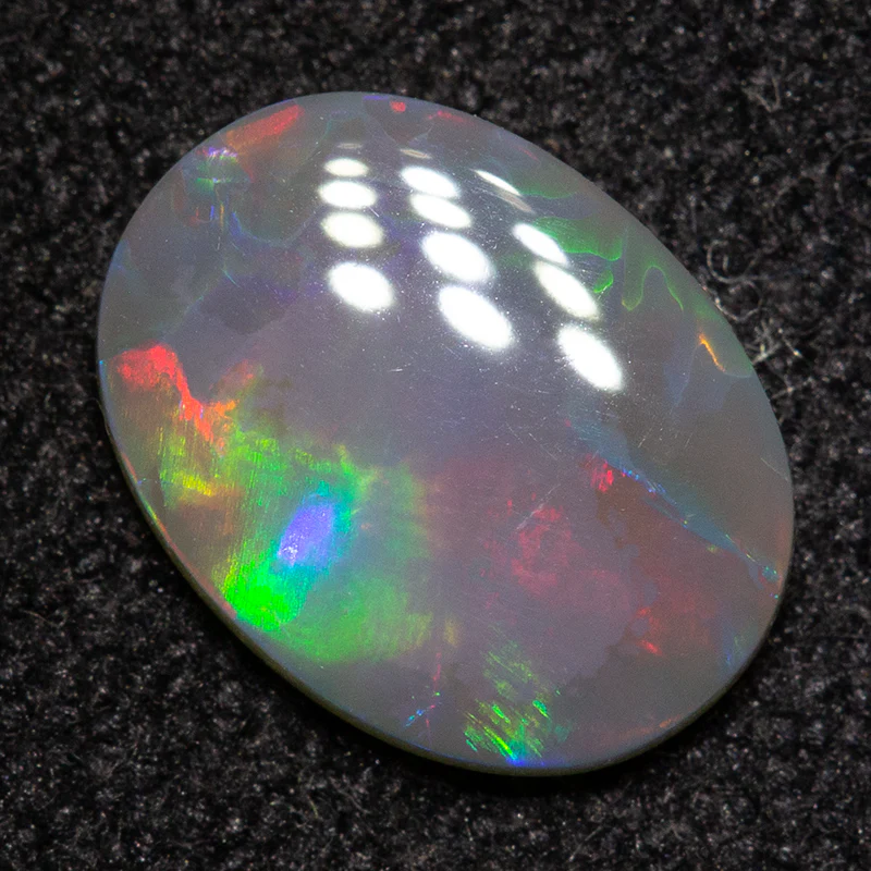 0.62 ct dark opal 8.4x6.3x1.7mm - Image 2
