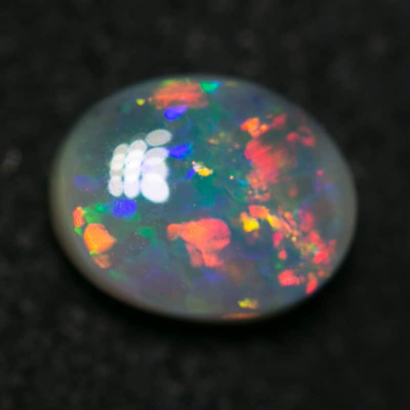 0.62 ct semi black opal 6.5x5x3mm - Image 2