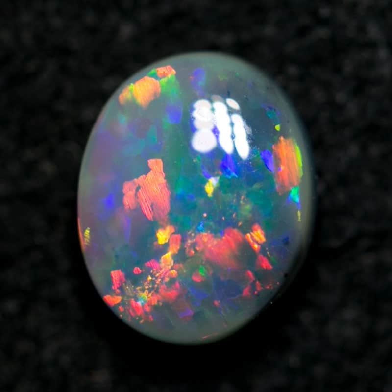0.62 ct semi black opal 6.5x5x3mm - Image 4