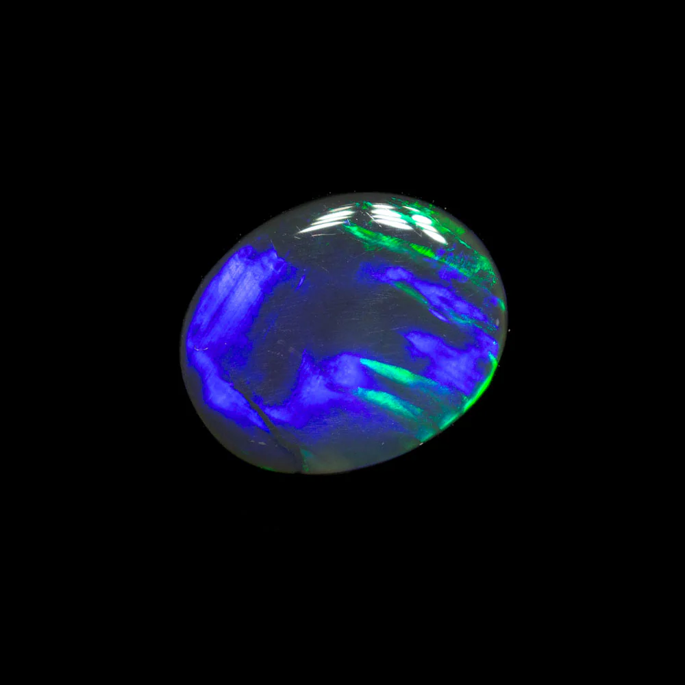 0.63 ct black opal 8x6.6x1.6mm - Image 2