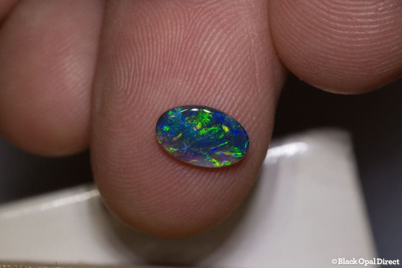 0.63 ct black opal 9x5.5x1.5mm - Image 2